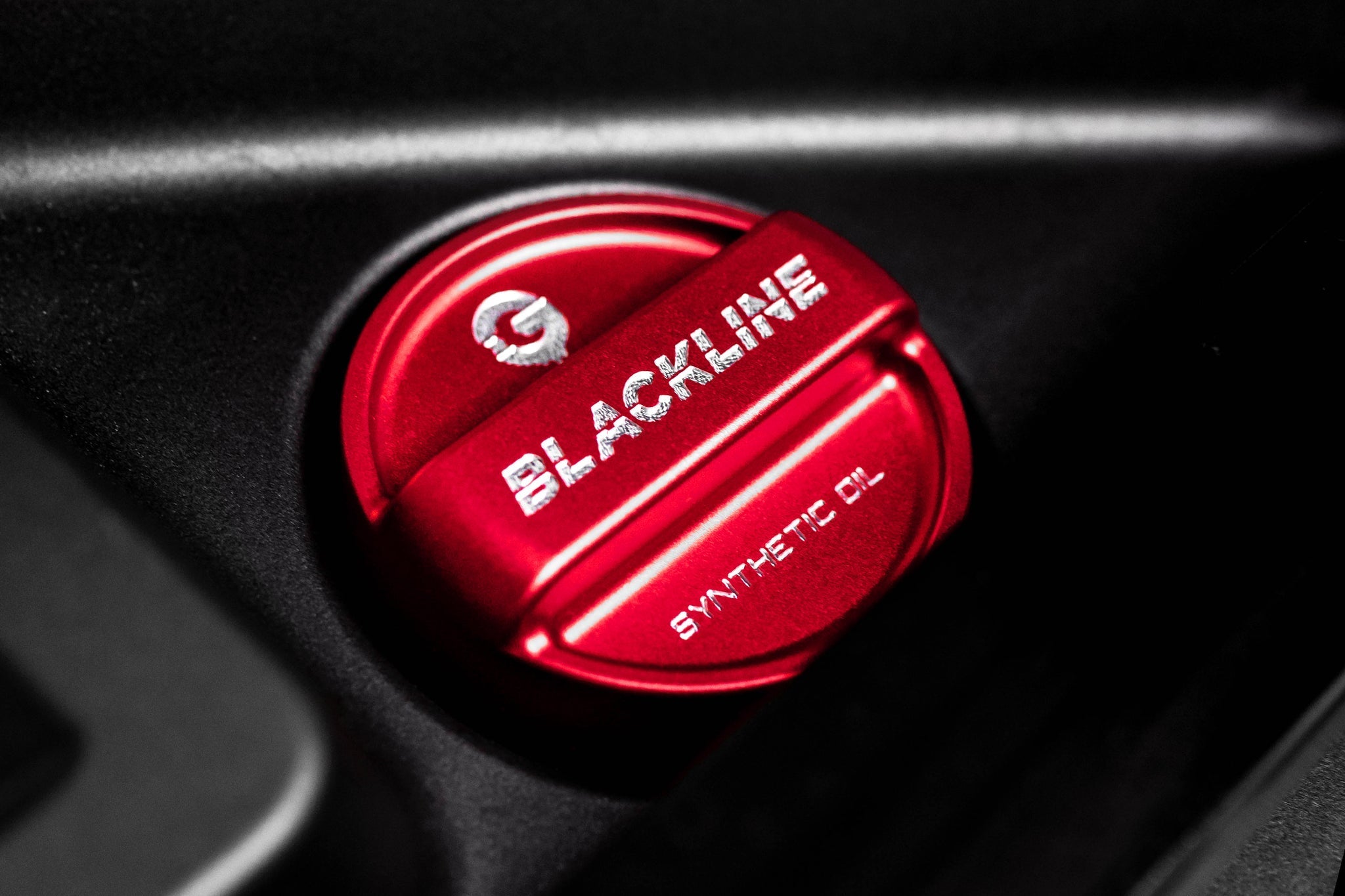 Close-up of Goldenwrench Engine Oil Cap installed on S58 cap