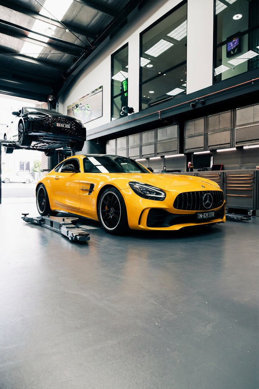 Yellow Mercedes-AMG GT in the Artarmon workshop